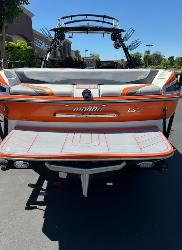 New upholstery, gelcoat and SeaDec (inside floor and swim platform and around bow) in this 2011 Malibu 247 - by James Boat and Fiberglass Repair, Dixon, CA